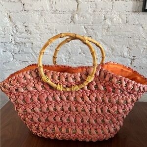 Perfect Redfish, woven purse with‎ bamboo handles..